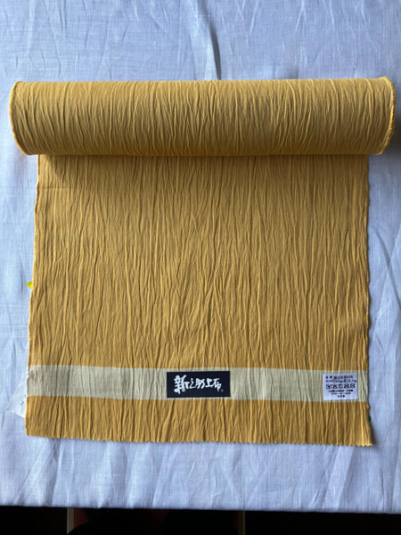 33_02 綿麻着尺反物 無地「ひまわりいろ」